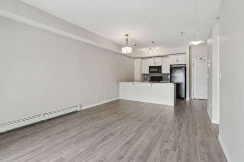 9205-101 Sunset Drive, Cochrane, AB - Indoor Photo Showing Kitchen