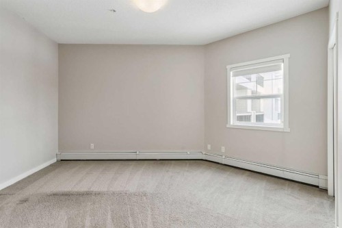 9205-101 Sunset Drive, Cochrane, AB - Indoor Photo Showing Other Room