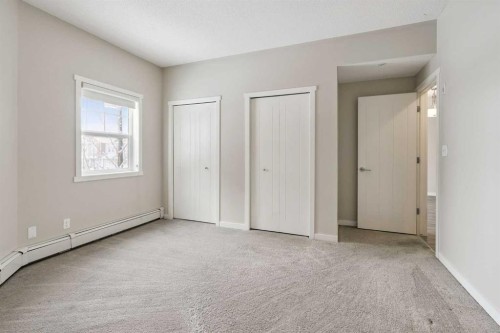 9205-101 Sunset Drive, Cochrane, AB - Indoor Photo Showing Other Room