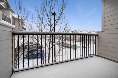 9205-101 Sunset Drive, Cochrane, AB - Outdoor With Balcony With Exterior