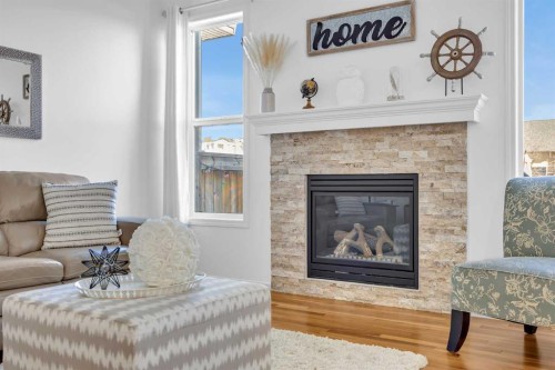 30 Cranarch View Se, Calgary, AB - Indoor Photo Showing Living Room With Fireplace