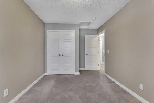 96 Cornerstone Passage Ne, Calgary, AB - Indoor Photo Showing Other Room