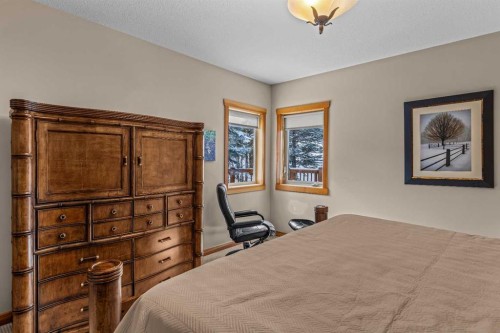 147 Hubman Landing, Canmore, AB - Indoor Photo Showing Bedroom