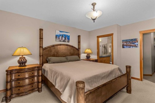 147 Hubman Landing, Canmore, AB - Indoor Photo Showing Bedroom