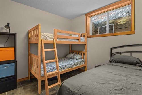 147 Hubman Landing, Canmore, AB - Indoor Photo Showing Bedroom