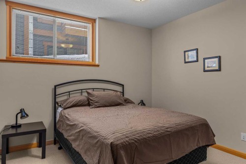 147 Hubman Landing, Canmore, AB - Indoor Photo Showing Bedroom