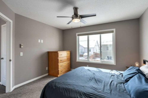 105 Wildrose Green, Strathmore, AB - Indoor Photo Showing Bedroom