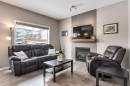 105 Wildrose Green, Strathmore, AB  - Indoor Photo Showing Living Room With Fireplace 
