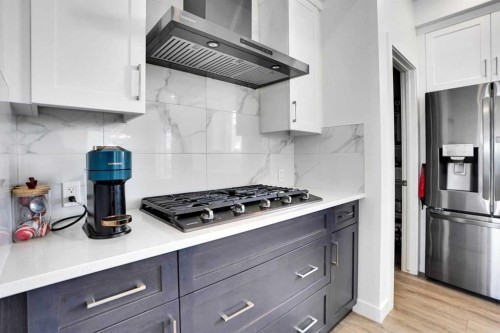 188 Brander Avenue, Langdon, AB - Indoor Photo Showing Kitchen With Upgraded Kitchen