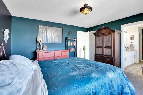 188 Brander Avenue, Langdon, AB - Indoor Photo Showing Bedroom