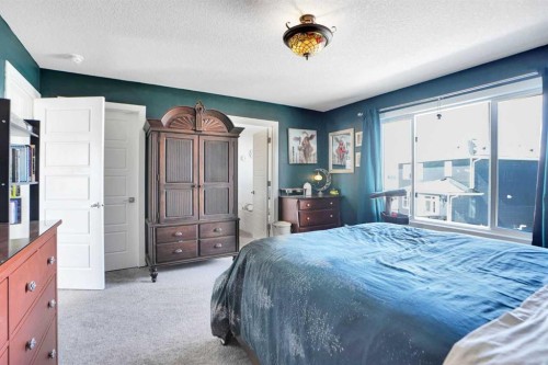 188 Brander Avenue, Langdon, AB - Indoor Photo Showing Bedroom
