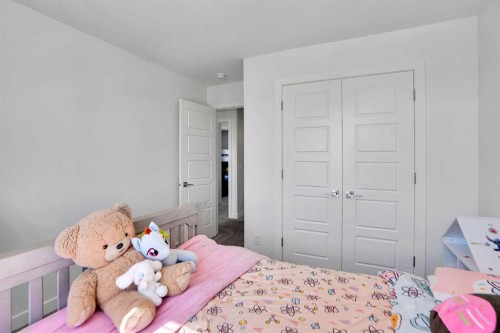 188 Brander Avenue, Langdon, AB - Indoor Photo Showing Bedroom