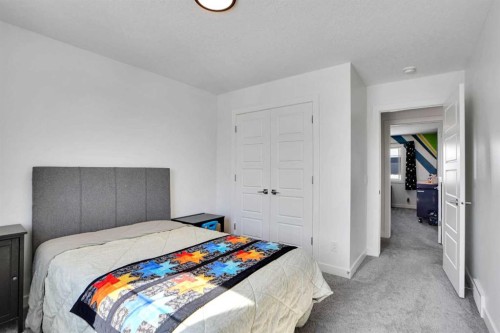 188 Brander Avenue, Langdon, AB - Indoor Photo Showing Bedroom
