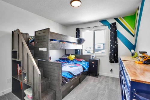 188 Brander Avenue, Langdon, AB - Indoor Photo Showing Bedroom