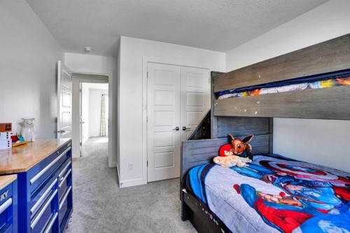 188 Brander Avenue, Langdon, AB - Indoor Photo Showing Bedroom