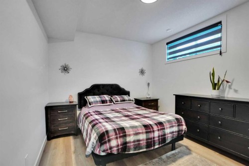 188 Brander Avenue, Langdon, AB - Indoor Photo Showing Bedroom
