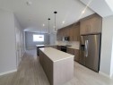 1045 West Lakeview Drive, Chestermere, AB  - Indoor Photo Showing Kitchen With Stainless Steel Kitchen With Upgraded Kitchen 