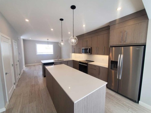 1045 West Lakeview Drive, Chestermere, AB - Indoor Photo Showing Kitchen With Stainless Steel Kitchen With Upgraded Kitchen
