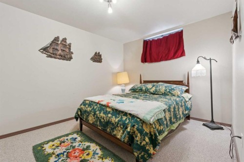 12 Westwood Crescent Sw, Calgary, AB - Indoor Photo Showing Bedroom