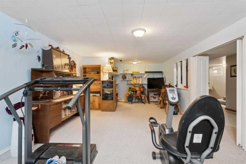 12 Westwood Crescent Sw, Calgary, AB - Indoor Photo Showing Gym Room