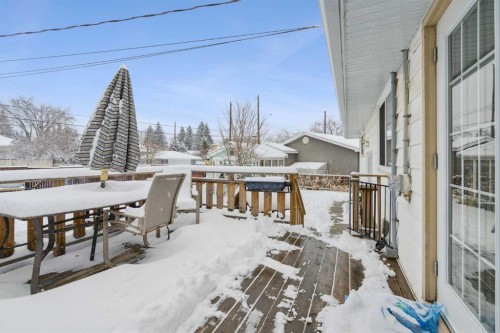 12 Westwood Crescent Sw, Calgary, AB - Outdoor With Deck Patio Veranda