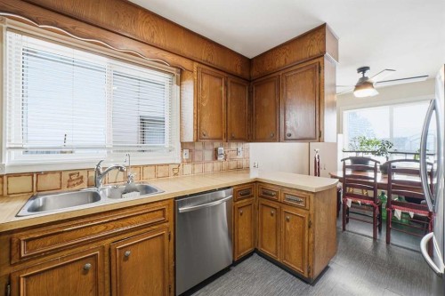 488 Templevale Drive Ne, Calgary, AB - Indoor Photo Showing Kitchen With Double Sink