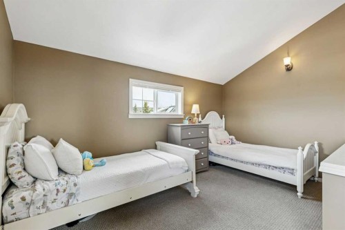 240 Cottageclub Crescent, Rural Rocky View County, AB - Indoor Photo Showing Bedroom