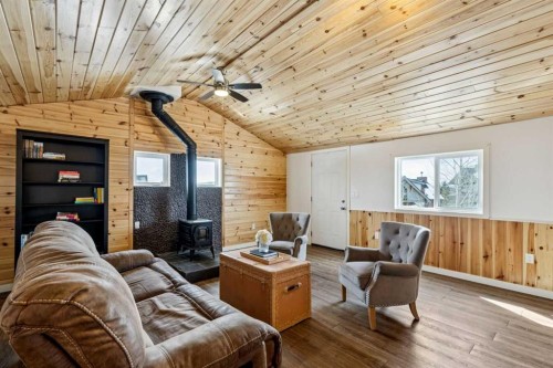 240 Cottageclub Crescent, Rural Rocky View County, AB - Indoor With Fireplace
