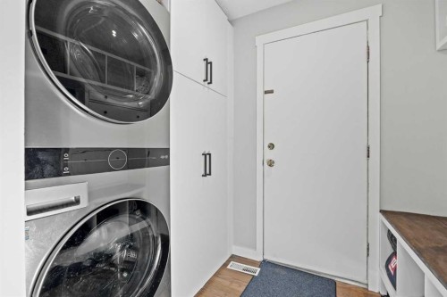 23 Millbank Drive Sw, Calgary, AB - Indoor Photo Showing Laundry Room