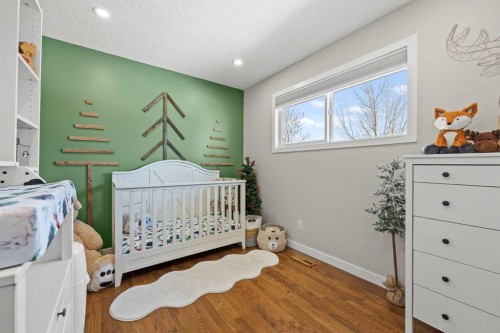 23 Millbank Drive Sw, Calgary, AB - Indoor Photo Showing Bedroom