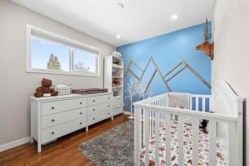 23 Millbank Drive Sw, Calgary, AB - Indoor Photo Showing Bedroom