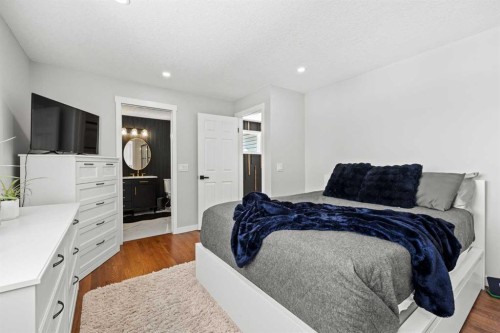 23 Millbank Drive Sw, Calgary, AB - Indoor Photo Showing Bedroom