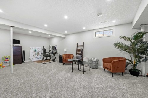 23 Millbank Drive Sw, Calgary, AB - Indoor Photo Showing Other Room