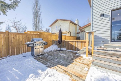 23 Millbank Drive Sw, Calgary, AB - Outdoor With Deck Patio Veranda