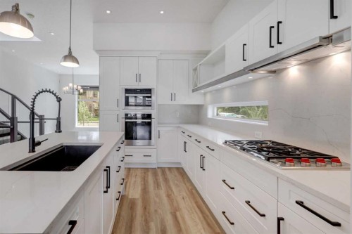 3422 5 Avenue Nw, Calgary, AB - Indoor Photo Showing Kitchen With Double Sink With Upgraded Kitchen