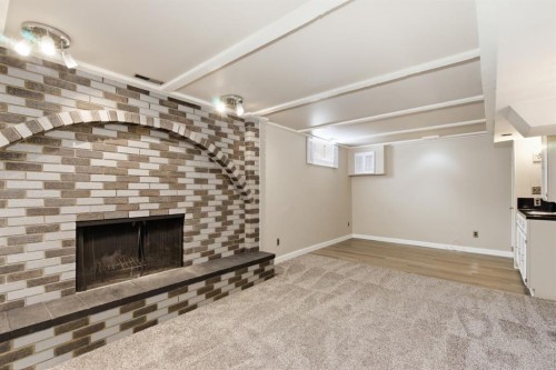 1315 Lake Michigan Crescent Se, Calgary, AB - Indoor With Fireplace