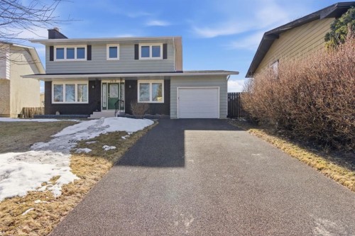 1315 Lake Michigan Crescent Se, Calgary, AB - Outdoor With Facade