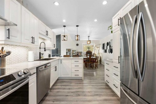48 Cedargrove Road Sw, Calgary, AB - Indoor Photo Showing Kitchen With Stainless Steel Kitchen With Upgraded Kitchen