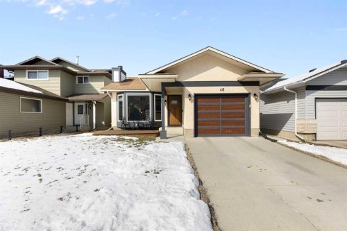 48 Cedargrove Road Sw, Calgary, AB - Outdoor With Facade