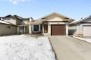 48 Cedargrove Road Sw, Calgary, AB  - Outdoor With Facade 