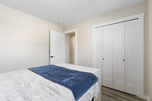 48 Cedargrove Road Sw, Calgary, AB - Indoor Photo Showing Bedroom