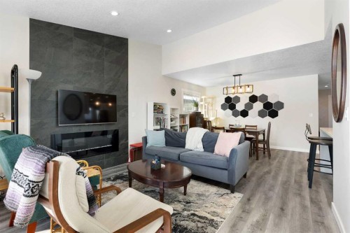 48 Cedargrove Road Sw, Calgary, AB - Indoor Photo Showing Living Room With Fireplace