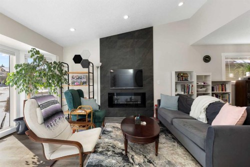 48 Cedargrove Road Sw, Calgary, AB - Indoor Photo Showing Living Room With Fireplace