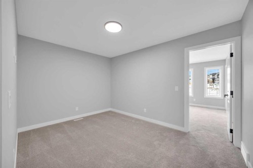 10 Versant Path Sw, Calgary, AB - Indoor Photo Showing Other Room