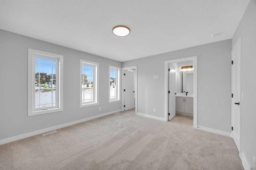 10 Versant Path Sw, Calgary, AB - Indoor Photo Showing Other Room