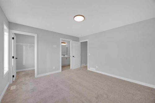 10 Versant Path Sw, Calgary, AB - Indoor Photo Showing Other Room