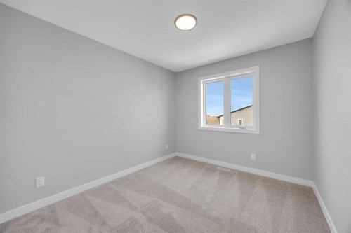 10 Versant Path Sw, Calgary, AB - Indoor Photo Showing Other Room