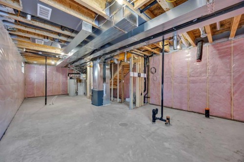 10 Versant Path Sw, Calgary, AB - Indoor Photo Showing Basement