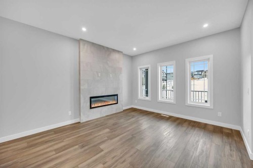 10 Versant Path Sw, Calgary, AB - Indoor With Fireplace