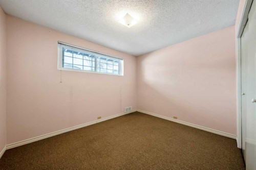1017 Mckinnon Drive Ne, Calgary, AB - Indoor Photo Showing Other Room